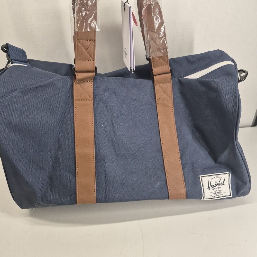 Herschel Novel Duffle Bag Navy Tan Retail: $120
